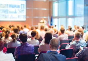 sample4 People sitting down at an event